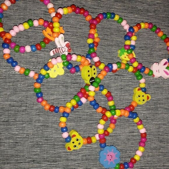 9 wooden beaded children's bracelets - Picture 3 of 7